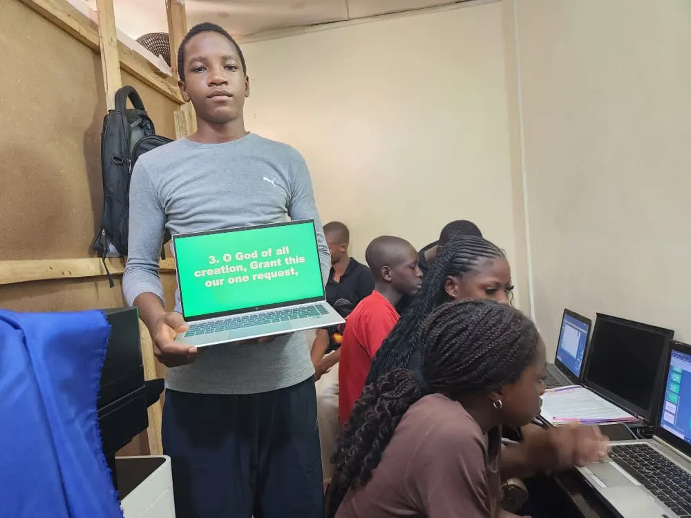 HCS student presenting a class project on screen