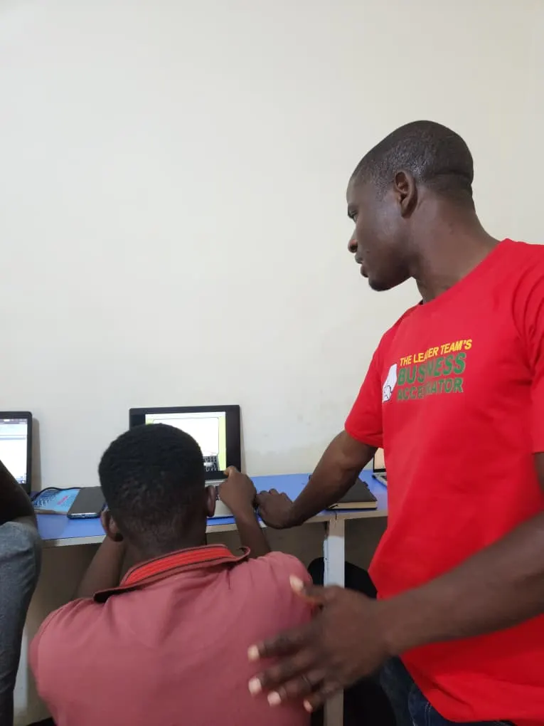 HCS instructor guiding a student through a practical exercise